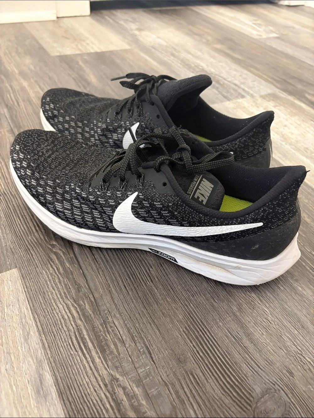 Nike Black and White Flyknit Running Sneakers